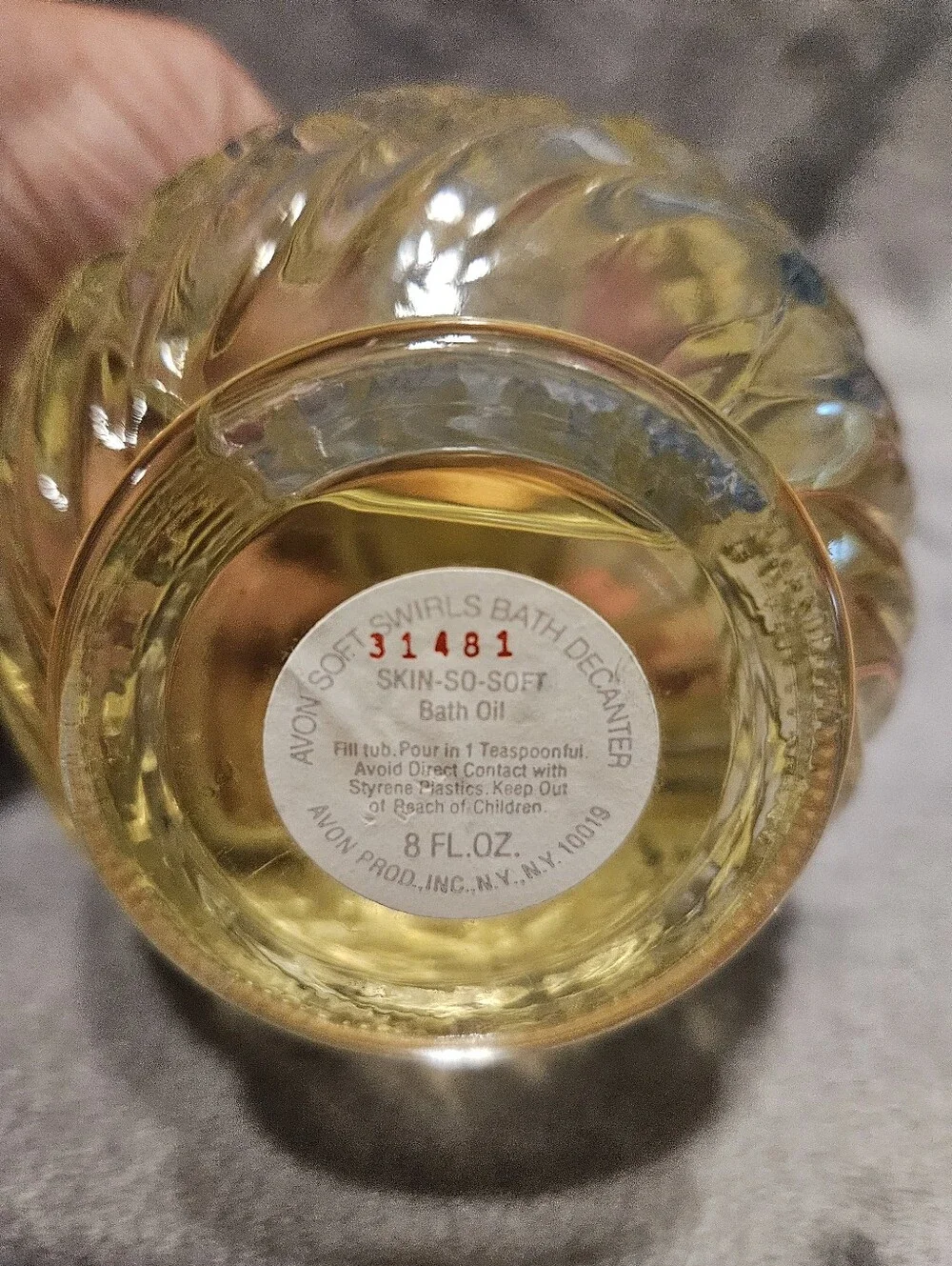 Vintage Avon Skin So Soft bath oil decanter.